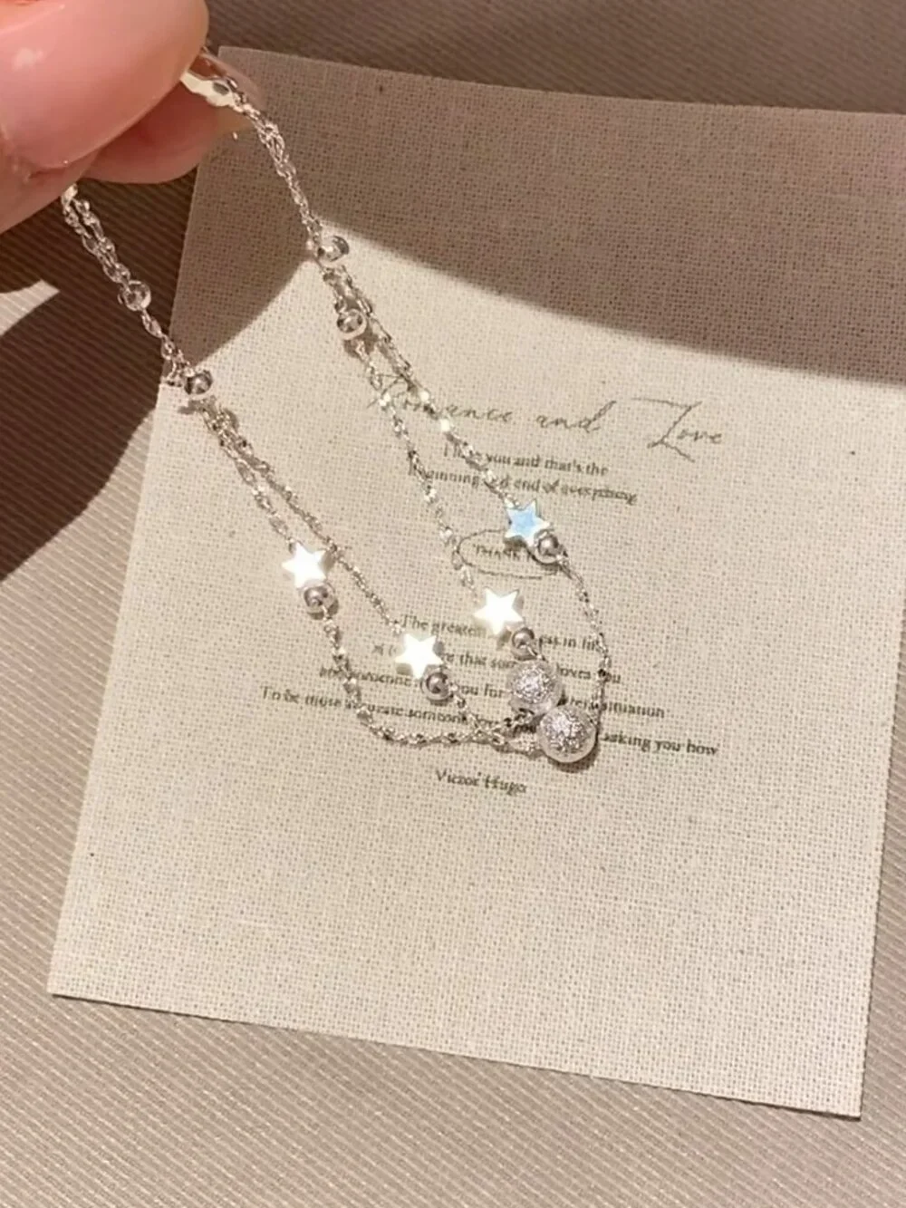 Dainty double strand star bracelet